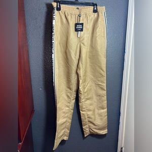 Men’s Opening Ceremony tan nylon track pants